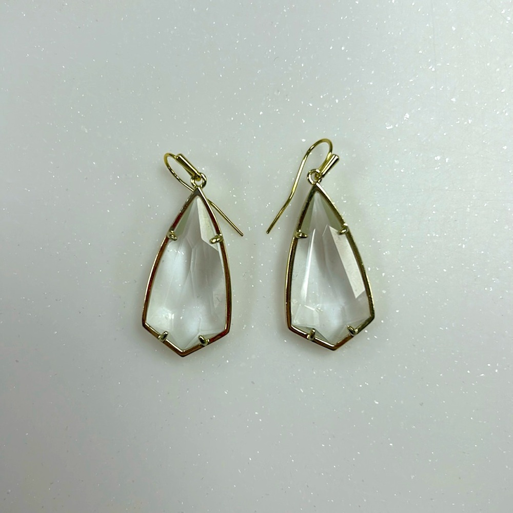 Kendra Scott drop iridescent earrings.
